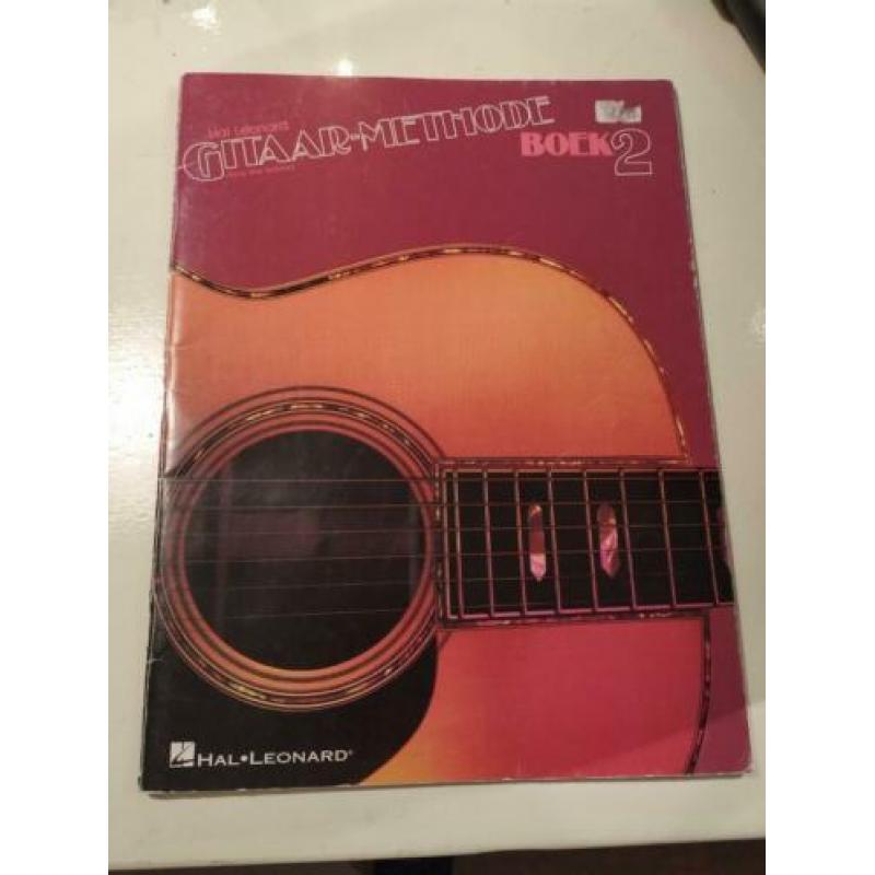 Gitaar lesboeken, standaard gitaar/voet/boek, capo,