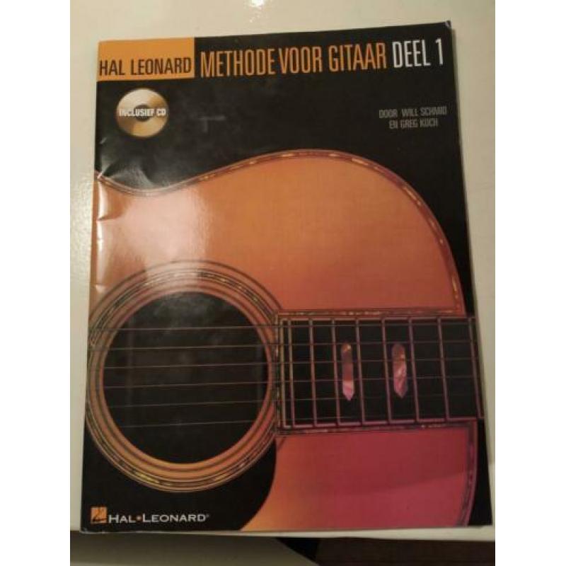 Gitaar lesboeken, standaard gitaar/voet/boek, capo,
