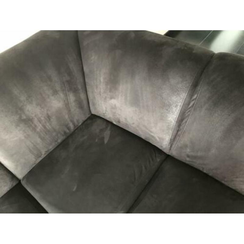 Zwarte hoekbank en fauteuil