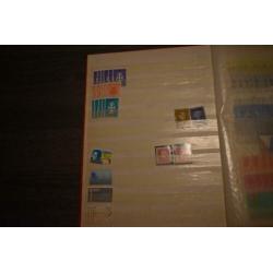 4) stockboek postzegels nederland postfris en iets gestempel
