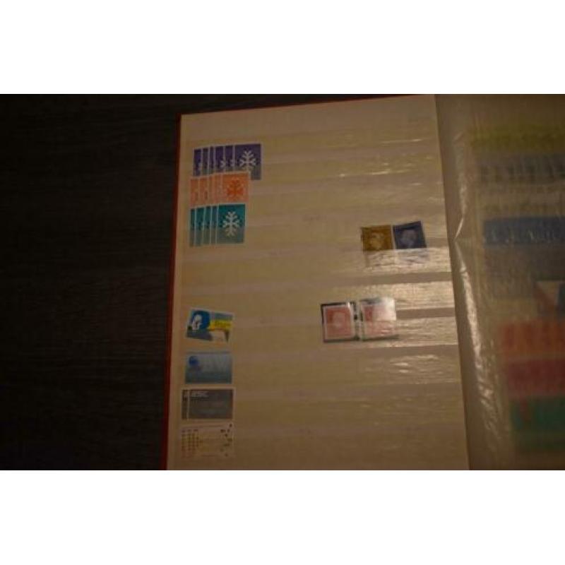 4) stockboek postzegels nederland postfris en iets gestempel