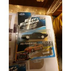 Fast & Furious wagens in de verpakking.