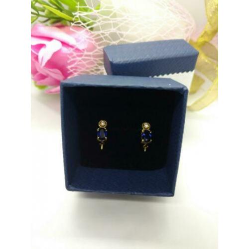 14k GOUD Oorbellen met blauw saffier and zirconia.