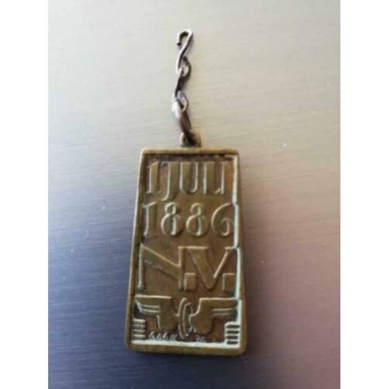 munt en hanger 1886 Groote Enveloppe Spoorwegen