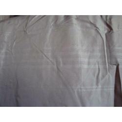 Warme nieuwe beige winterjas met een blokje. One size