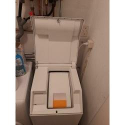Miele wasmachine bovenlader