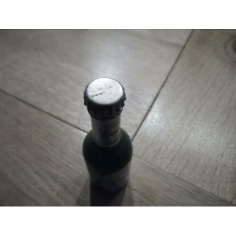Aansteker. Heineken fles
