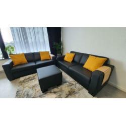 Leren zwarte bankstel met hocker