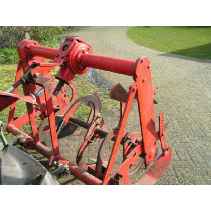 Spitmachine
