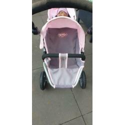 Baby born tweelingpoppenwagen met bruine pop met nieuw setje