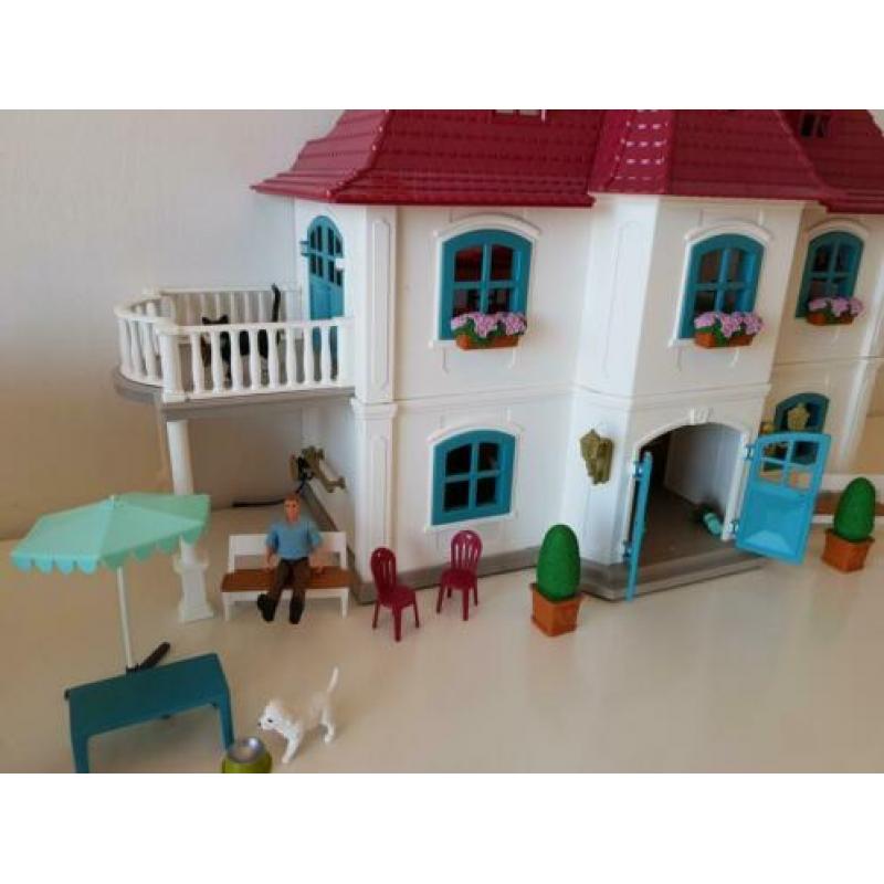 Schleich huis en stal,20 paarden en toebehoren