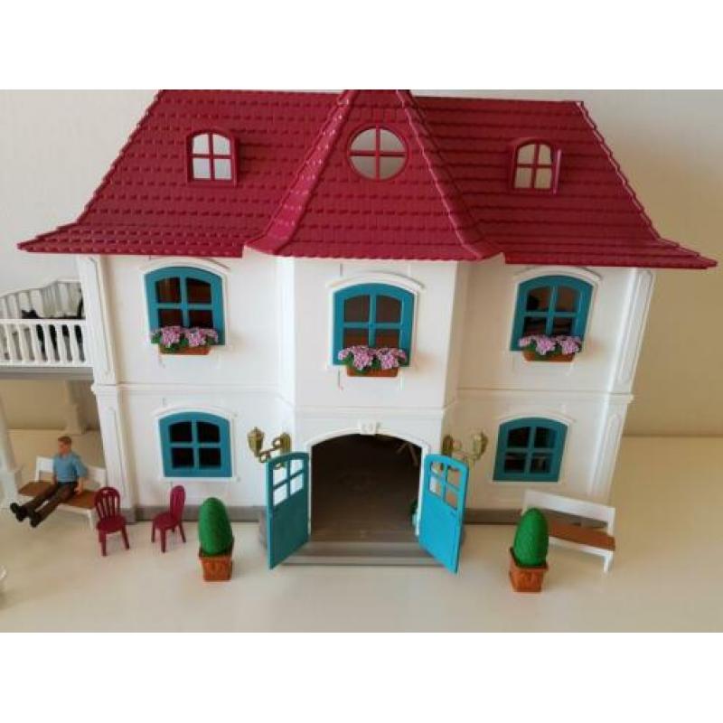 Schleich huis en stal,20 paarden en toebehoren