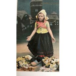 Gelukkig Nieuwjaar. Meisje klederdracht,klompen,bloemen,1909