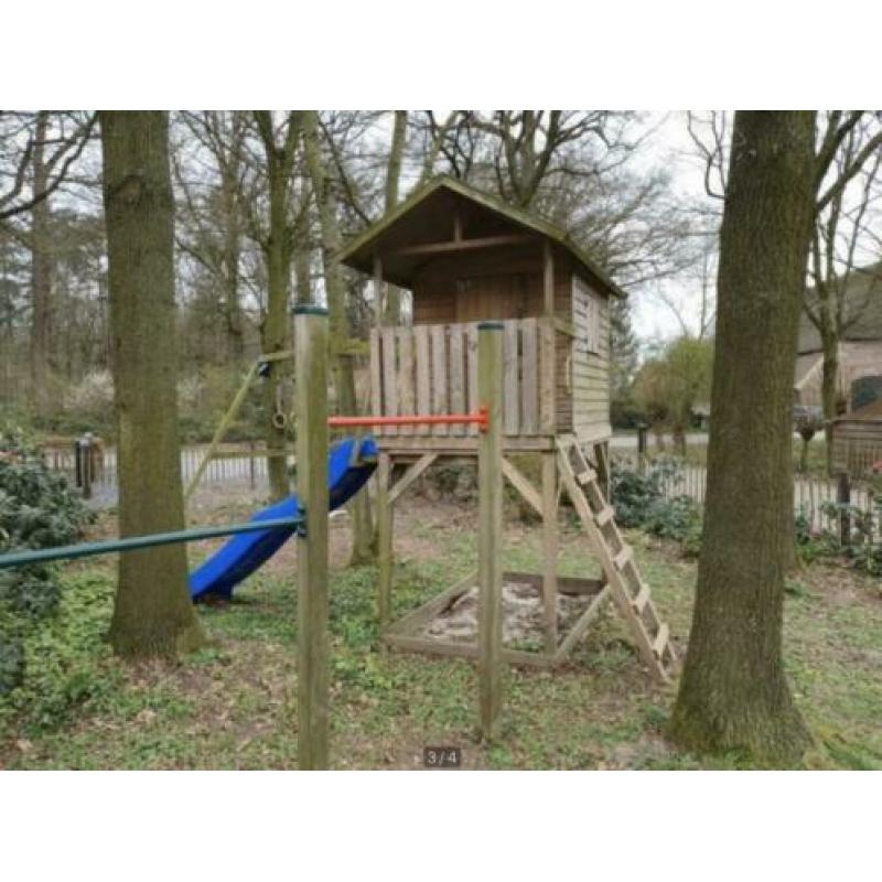 Speelhuisje glijbaan schommel ringen