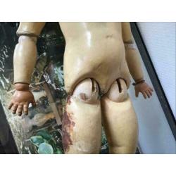Antieke pop van papier mache