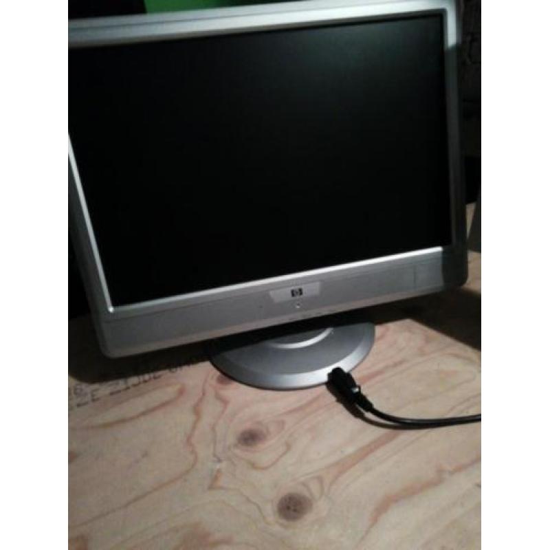 Twee computer schermen