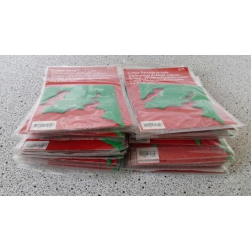 Te koop 26 zakjes Crêpe kerstdecoratie.