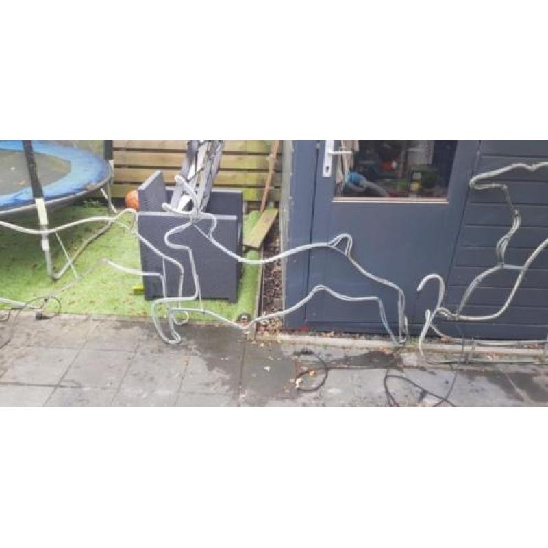 Kerstman in arreslee met 2 rendieren