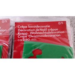 Te koop 26 zakjes Crêpe kerstdecoratie.