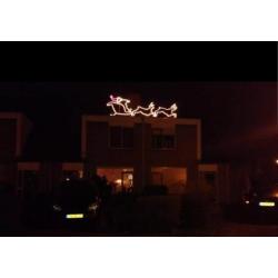 Kerstman in arreslee met 2 rendieren